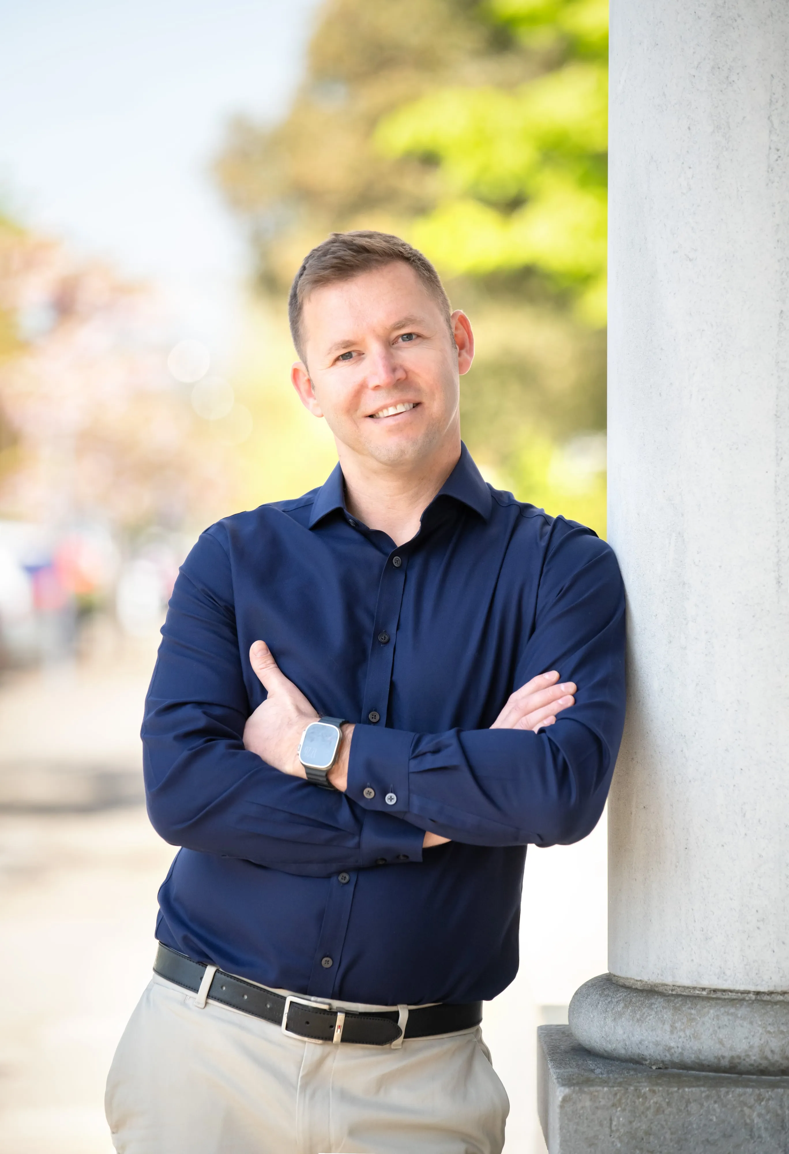 Man on column corporate personal-brand portrait