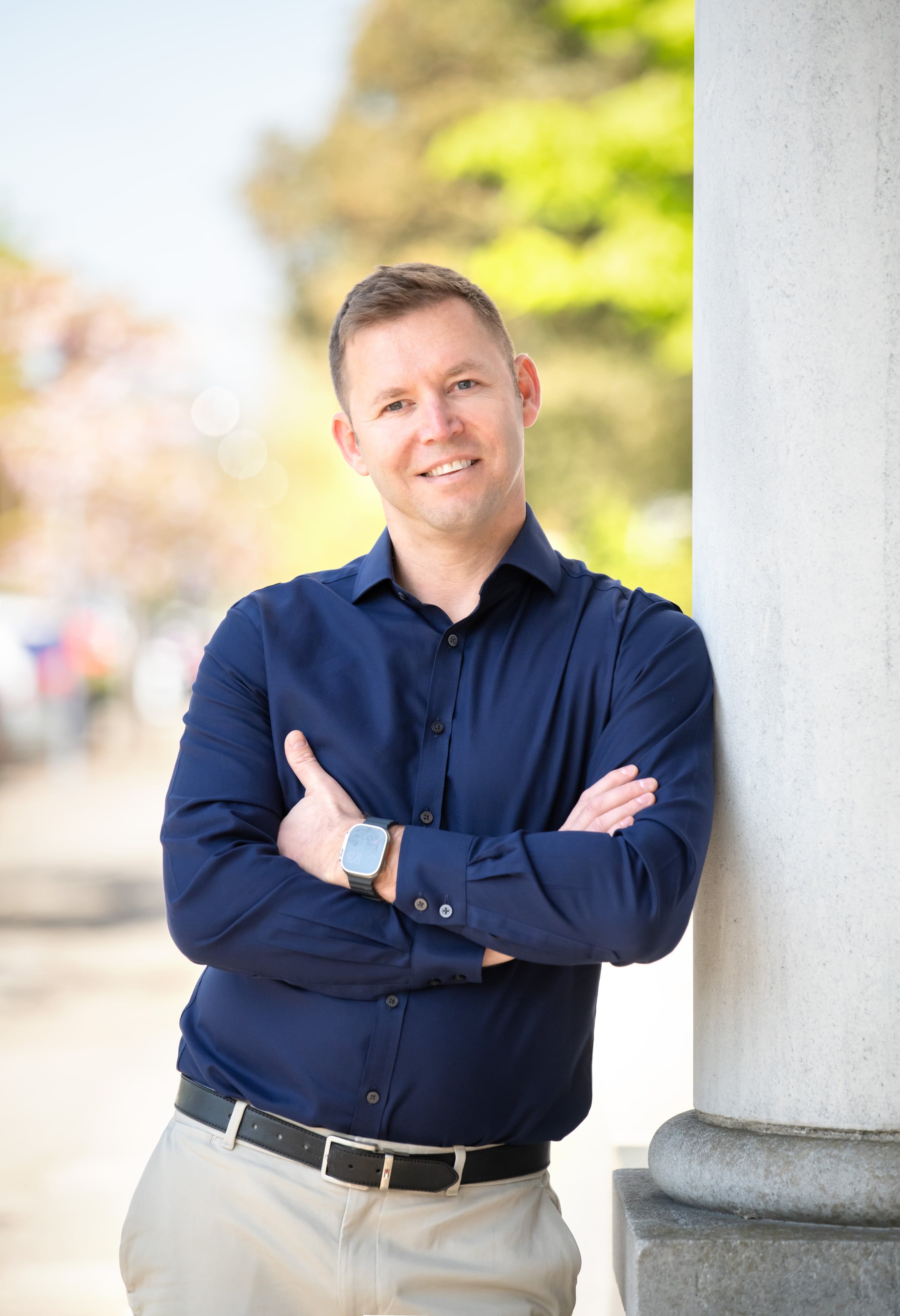 Man on column corporate personal-brand portrait