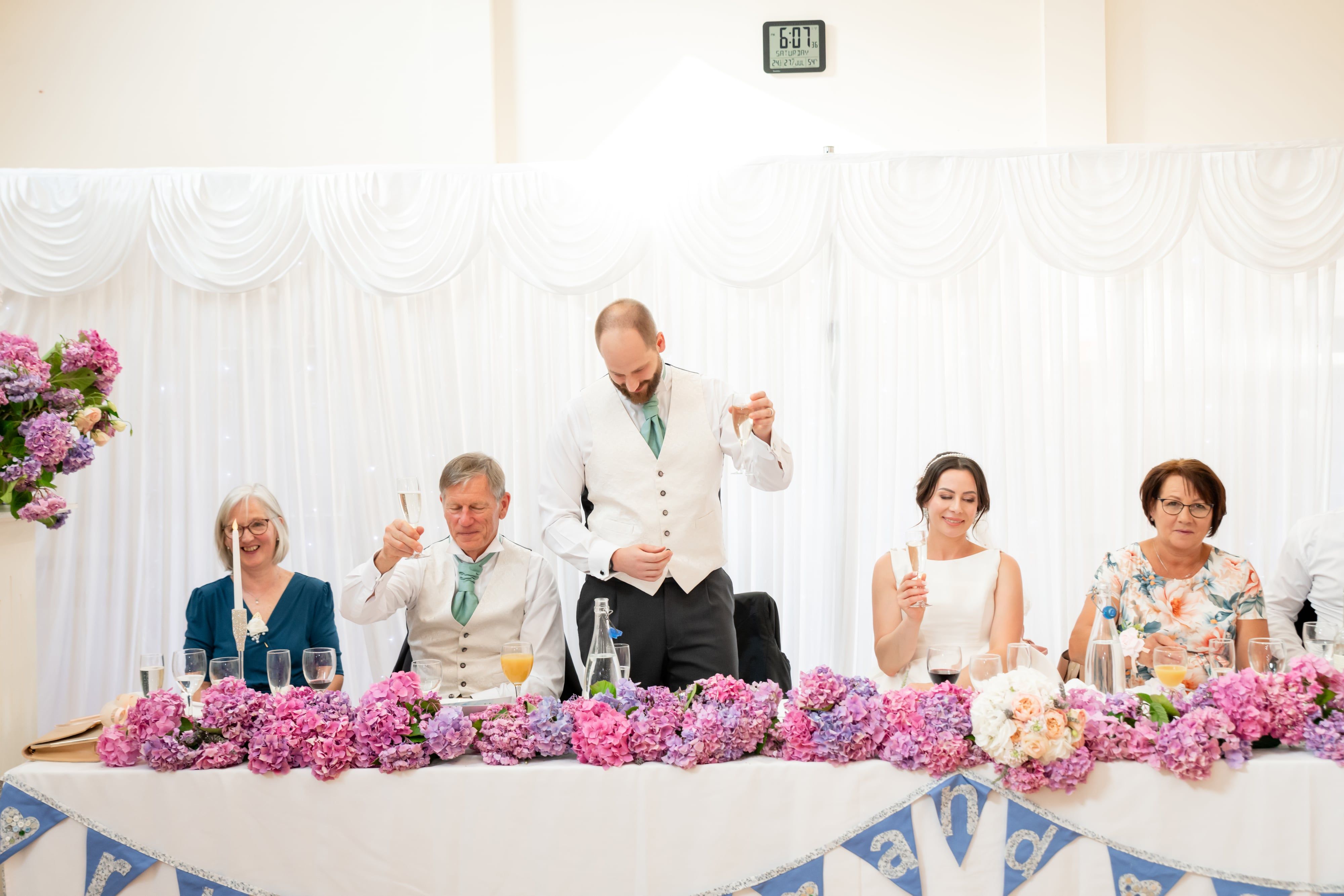 Top-table toast raised during the father-of-the-bride speech