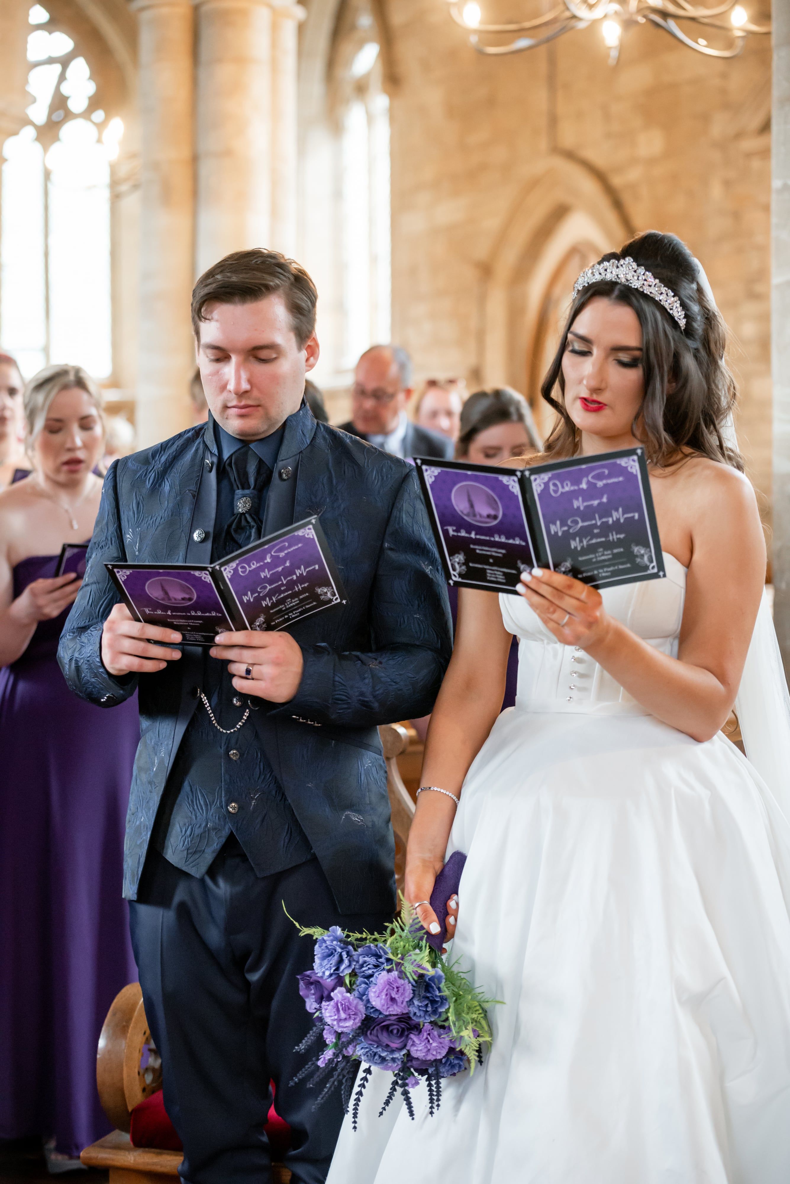 Bride and groom read the order of service side by side